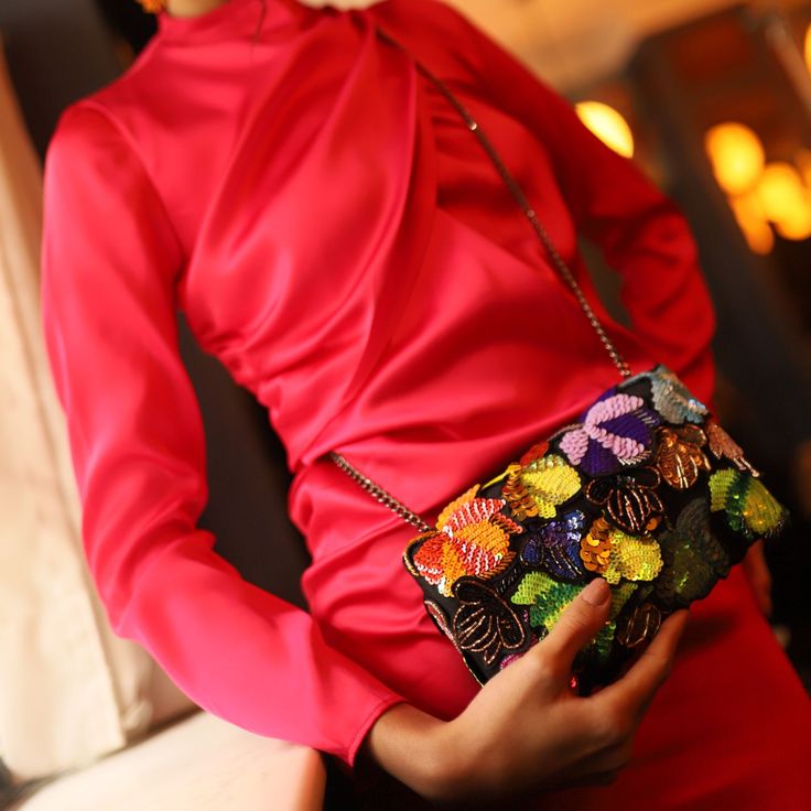 Designed for the bold-hearted babes who dance to their own rhythm, this clutch is a burst of neon rebellion against the mundane. Add this clutch to your cart if you're ready to defy convention and infuse your style with a riot of contrasting hues. When being quiet in fashion may be the norn, our loud and luxuriously crafted Neon Aurelia Clutch is your ticket to a world where bold is beautiful and the ordinary is left far behind! Composition Hand embroidered multi colored sequin flowers stitched Silk Clutch, Metal Chain, The Ordinary, Wearable Art, Timeless Elegance, Hand Embroidered, Color Design, Neon