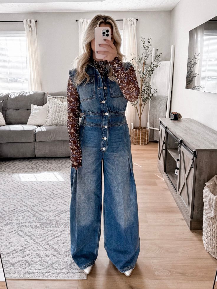 Model is 5'1", 34D, 6/28 and is wearing a size small. Item runs true to size - if you want a snug fit size down. Our McCallum Denim Jumpsuit features a medium wash true denim material, collared neckline, functional buttons down bodice, functional pockets on chest, pleated pant, wide leg pant. inseam: approx 28 1/2" More details: 100% cotton. hand wash or wash on cold and hang to dry. Fitted Denim Jumpsuit With Straight Leg, Relaxed Fit Full Length Denim Jumpsuit, Spring Full Length Denim Jumpsuit, Fitted Denim Jumpsuit With Straight Leg In Medium Wash, Straight Leg Denim Jumpsuit In Light Wash For Fall, Fitted Straight Leg Denim Jumpsuit In Medium Wash, Fall Light Wash Straight Leg Denim Jumpsuit, Fitted Straight Leg Medium Wash Denim Jumpsuit, Dark Wash Denim Overall Jumpsuit For Fall