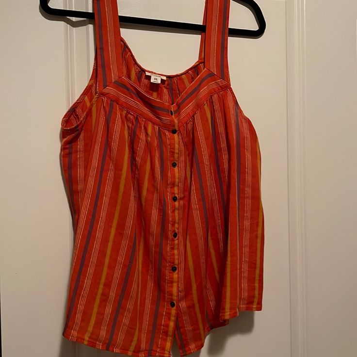 A.N.A Orange Top With Thick Tank Top Straps Striped Orange, Tan, And Blue Stripes Faux Buttons Down Front Nwt, Never Worn Size Xxl Casual Sleeveless Multicolor Blouse, Summer Orange Sleeveless Blouse, Orange Sleeveless Blouse For Summer, Orange Vest Top For Spring, Orange Cotton Tank Top For Vacation, Orange Tank Top For Summer Day Out, Casual Orange Tank Top For Beach, Orange Tank Top For Day Out In Summer, Casual Orange Tank Top For The Beach