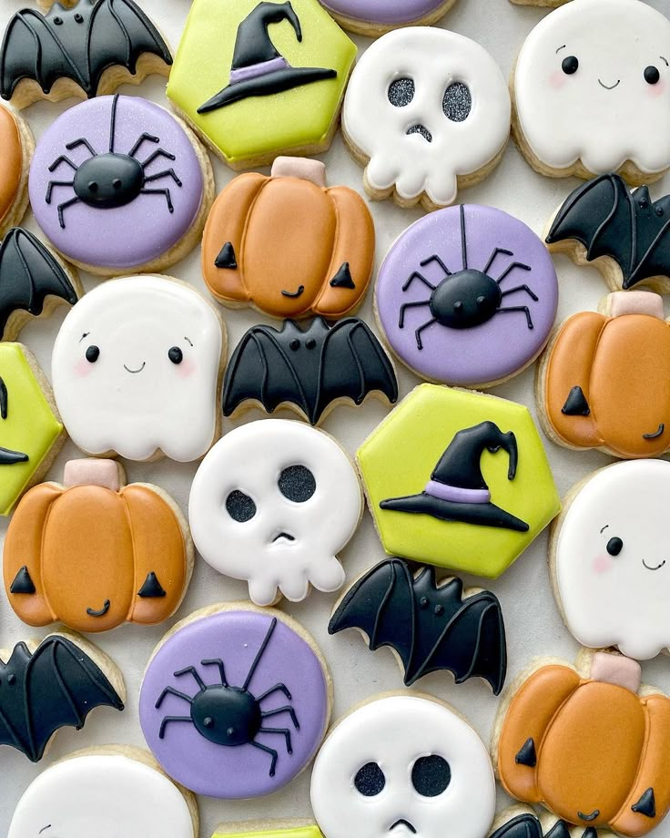 halloween cookies decorated with icing and decorations