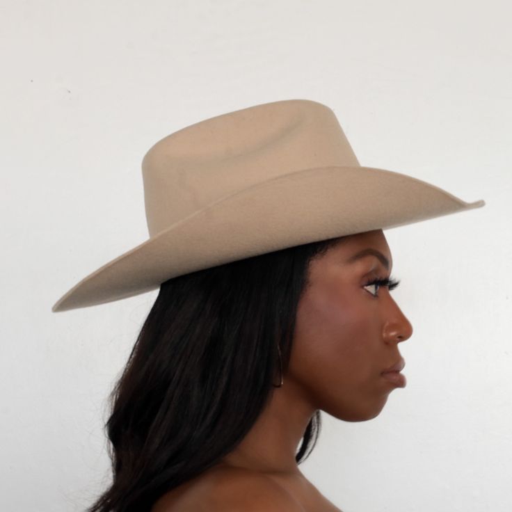 The Upland Western Cowboy Hat seamlessly blends the rustic charm of the Wild West with a dash of futuristic boho flair. With its distinctive cowboy silhouette, complete with a cattleman creased crown and a stylish upturned brim, this hat exudes classic Texan allure. The leather band is adorned with gleaming silver jewels, adding a contemporary twist to this timeless fashion statement. Handcrafted and meticulously embroidered with the initials "BTR," this hat exemplifies the perfect fusion of tra Western Curved Brim Hat For Rodeo, Western Style Flat Brim Hat For Rodeo, Fitted Country Style Top Hat For Rodeo, Western Flat Brim Hat For Rodeo, Country Style Wide Brim Top Hat For Rodeo, Country Style Brimmed Top Hat For Ranch, Western Style Fitted Top Hat For Rodeo, Western Style Wide Brim Hat For Fall, Western Style Flat Brim Hat For Ranch