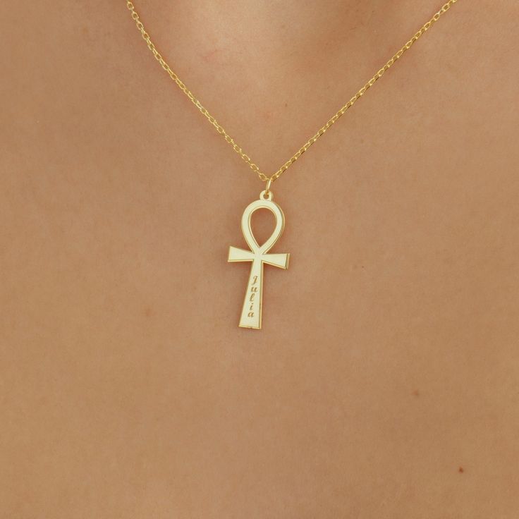 Personalized Ankh Pendant Necklace. Christmas Gift, 8k Solid Gold, 14k Solid Gold, 18k Solid Gold Ankh Necklace, Ankh Pendant, Gifts for Her, Ancient Necklace, Egyptian Necklace, Antique Necklace, Ankh Jewelry, Gift for Friend, Name Necklace The ancient Egyptian symbol Ankh, also known as the "Key of the Nile," the "Cross of Life," literally means life. Symbolically, on the other hand, it symbolizes the unity of men and women. It represents the sun, rebirth, and intuitive powers. At the same tim Symbolic Engraved Brass Jewelry, Silver Ankh Necklace In Brass, Symbolic Brass Jewelry For Anniversary, Symbolic Etched Jewelry For Ceremonial Occasions, Symbolic Ceremonial Etched Jewelry, Traditional Yellow Gold Personalized Jewelry, Ceremonial Symbolic Etched Jewelry, Spiritual Wedding Jewelry With Charms, Traditional Personalized Yellow Gold Jewelry