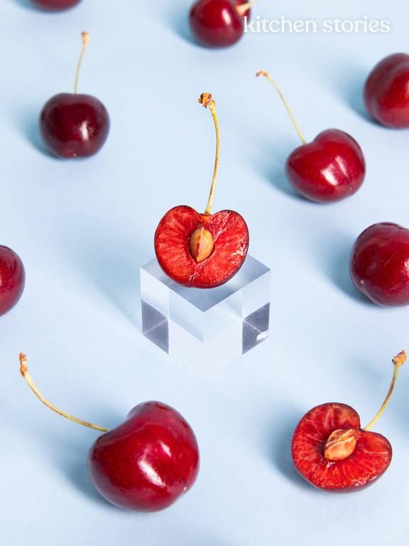 cherries are arranged in the shape of cubes