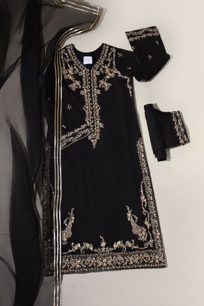 Glaza Black Semi-stitched Palazzo Set With Mirror Work, Black Chanderi Palazzo Set With Mirror Work, Black Designer Kurta With Gota Work, Elegant Black Salwar Kameez With Gota Work, Black Palazzo Set With Sheer Dupatta, Black Georgette Sharara With Dabka Work, Traditional Black Kurta With Gota Work, Black Chanderi Palazzo Set For Wedding, Black Sharara For Wedding Festivities