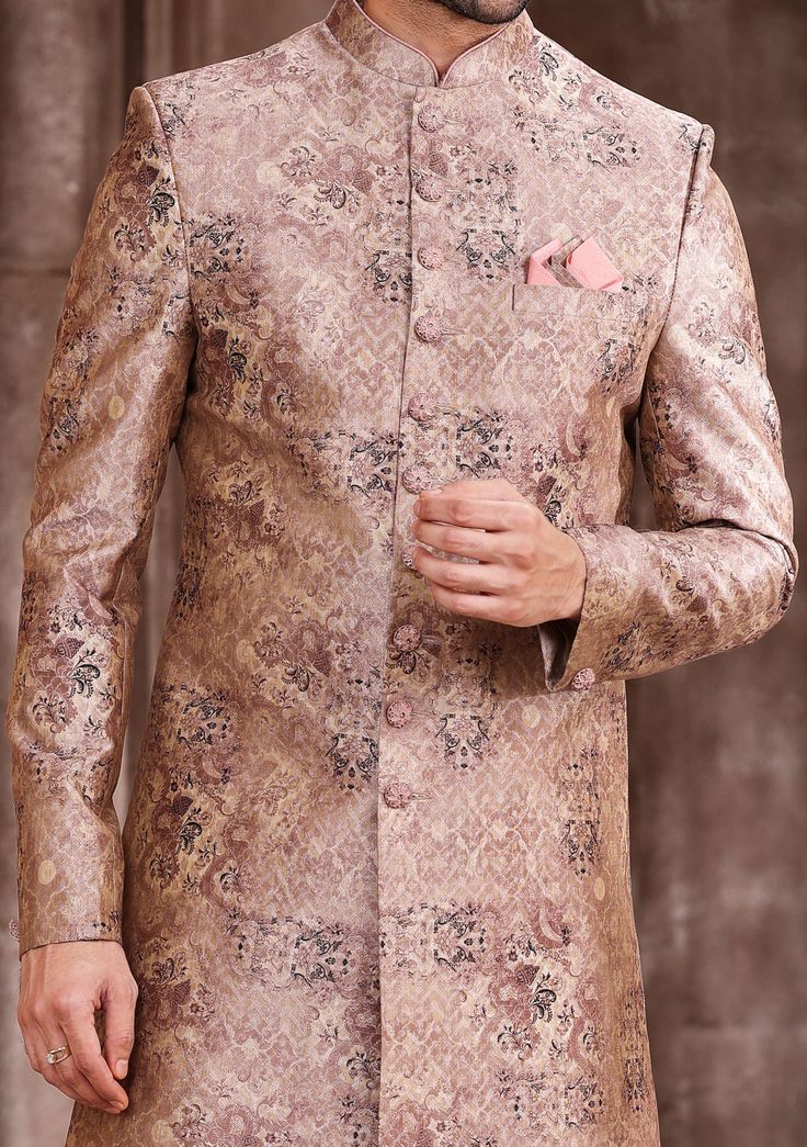 Ready-Made Sherwani With Trouser. All Over Jacquard Brocade Style Printed Fabric Top. Art Dupion Aligarhi Ready Made Trouser. Crafted in Chinese Collar Neck, and Full Sleeve. Satin Lining with Plain Work. High-Quality Matching Buttons. Please Note: The footwear shown in the picture is for presentation and photography purpose only. Color: There might be slight color variation due to lightings and flashes while photo shooting. The color may also vary because of different screen resolutions. Wash C Ceremonial Fitted Nehru Jacket With Self Design, Brocade Unstitched Suit For Wedding, Straight Kurta Style, Fitted Nehru Jacket With Pallu For Eid, Self Design Nehru Jacket For Wedding And Transitional Seasons, Fitted Kurta With Naqshi For Transitional Season, Fitted Pink Kurta For Ceremonial Occasions, Formal Festive Sets With Straight Kurta, Unstitched Formal Sets For Festive Occasions, Fitted Long Sleeve Churidar With Naqshi