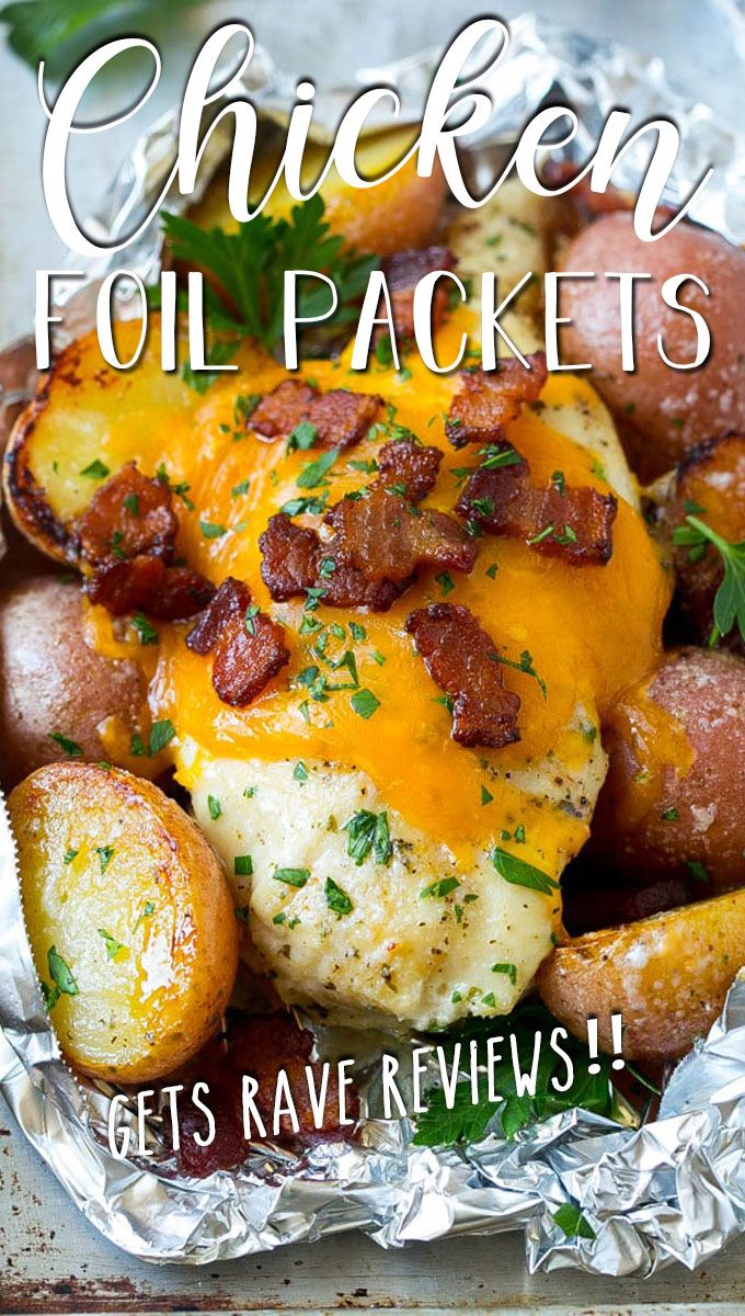 chicken foil packets with potatoes and cheese on top