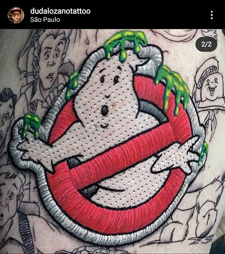 an image of a cartoon character on the back of a man's stomach