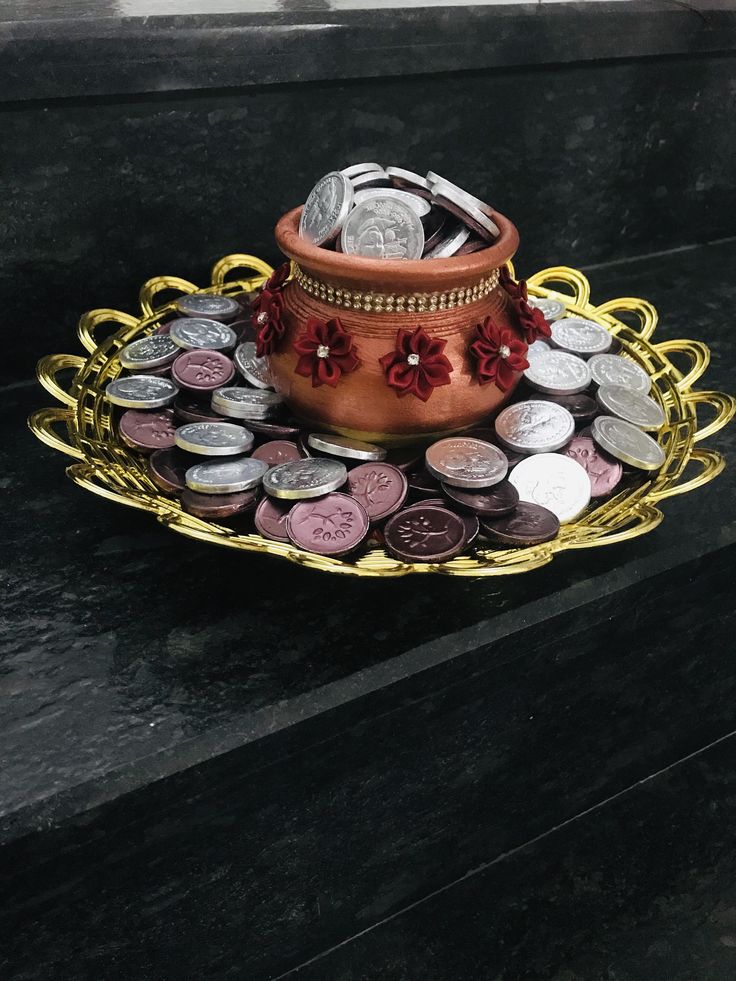 a tray with some coins on top of it