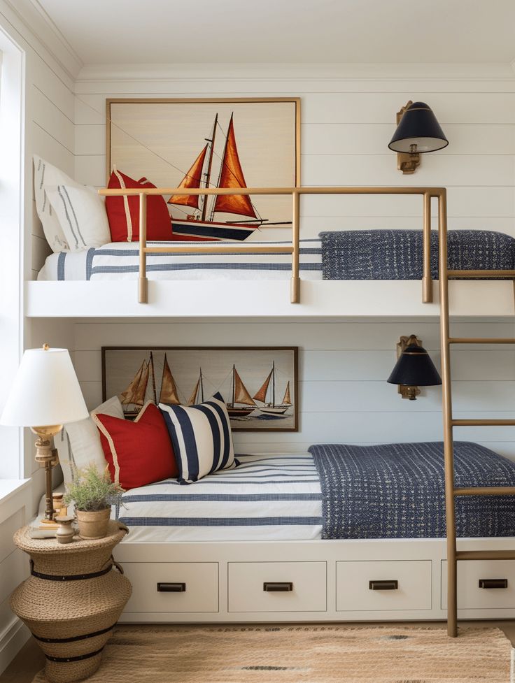 a bedroom with two bunk beds and some pillows on the bottom bunk, next to a lamp