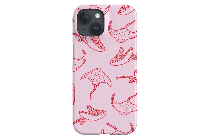 a pink phone case with red and white umbrellas on it