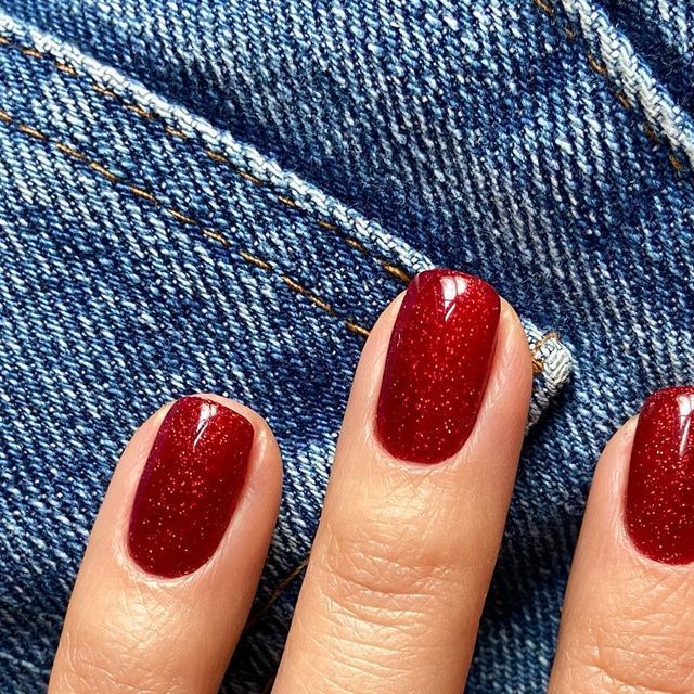 Nail design on Instagram: "I wanted this redcurrant jam effect so much! But I didn’t have any red glitter. So I covered nails with glitter and added red glass gel over it. Yummy 🤤 #annanailsberlin🔸me" Red Glitter Gel Nails, Red Nails With Glitter Accent, Red Glitter Nails Almond Shape, Red Nail Glitter, Red Tip Nails With Design, Red And Sparkle Nails, December Nail Ideas Gel, Sparkly Red Acrylic Nails, Christmas Nails Sparkly Red