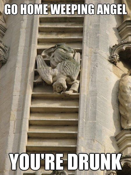 a gargoyle sitting on top of a window sill with the caption, go home weeping angel you're drunk