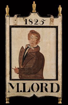 an old wooden sign with a portrait of a man