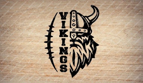 the viking logo is on a wooden surface