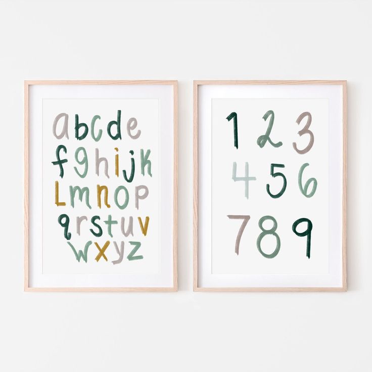 two framed art pieces with numbers and letters on them, one is green and the other is brown