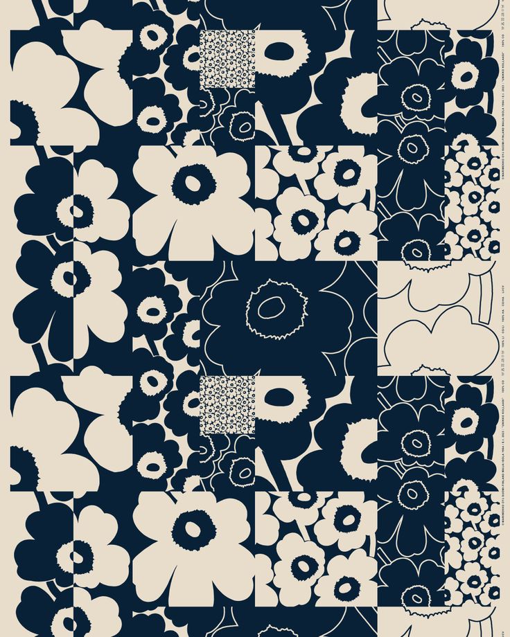 a blue and white patchwork design with flowers on the front, in different colors