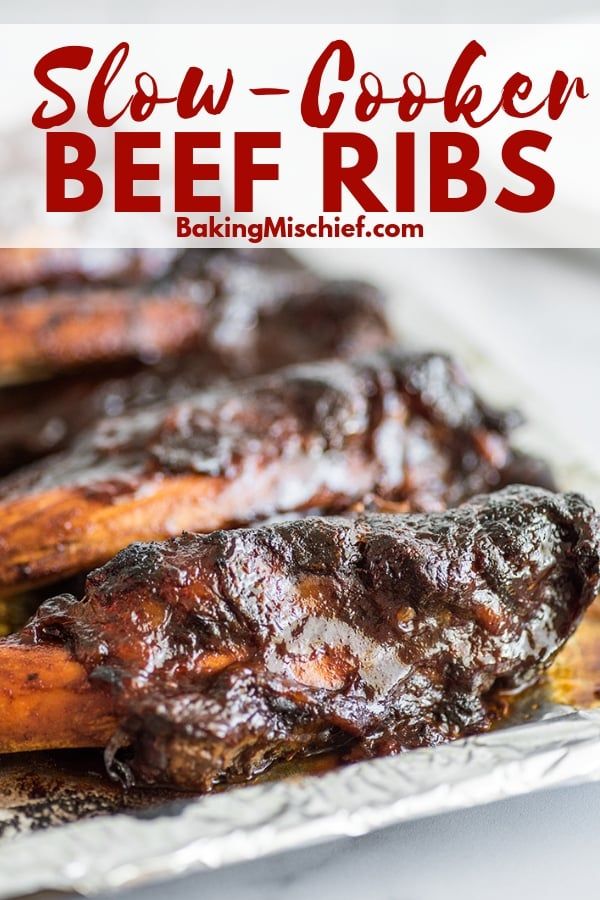 slow - cooker beef ribs on tin foil with text overlay