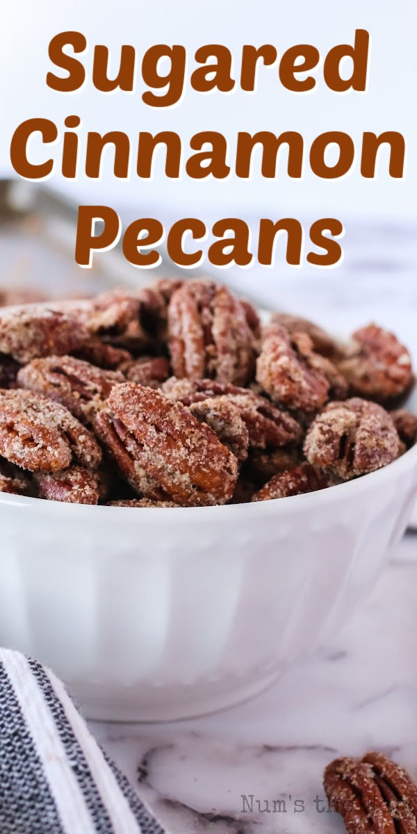 sugared cinnamon pecans in a white bowl