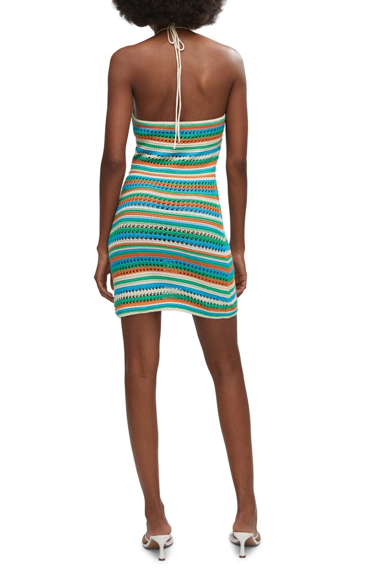 Enter your next cabana party in colorful style with this bright crochet minidress showcasing dainty open stitching. Ties at neck Halter neck Unlined 52% cotton, 48% polyester Hand wash, dry flat Made in Turkey Fitted Mini Dress With Crochet Trim, Summer Crochet Mini Dress For Day Out, Beachwear Cotton Mini Dress, Spring Beach Party Crochet Mini Dress, Casual Crochet Mini Dress For Beach Party, Spring Crochet Mini Dress For Beach Party, Multicolor Beachwear Mini Dress For Summer Parties, Summer Mini Length Crochet Dress For Poolside, Beach Crochet Mini Dress