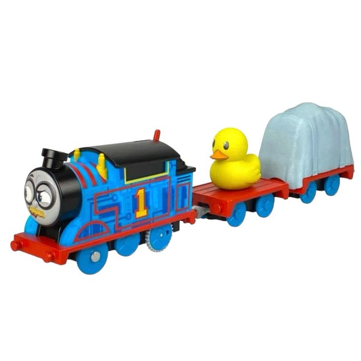 a toy train with a rubber ducky on the front and an angry bird on the back