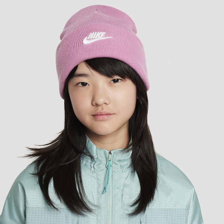 Turn chilly days into cozy ones with our Nike Peak beanie. Made from softly knit yarn, it has a fold-over cuff that lets you personalize your look. Casual Soft Beanie For Fall, Casual Soft Solid Color Beanie, Casual Warm Beanie For Cold Weather, Warm Casual Beanie For Cold Weather, Casual Super Soft Hats For Cold Weather, Casual Super Soft Cap, Casual Super Soft Winter Hats, Casual Soft Knit Beanie For Spring, Trendy Pink Cotton Beanie