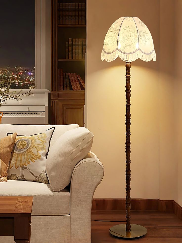 a living room scene with focus on the floor lamp