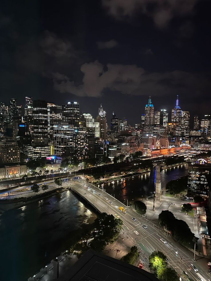 an aerial view of a city at night