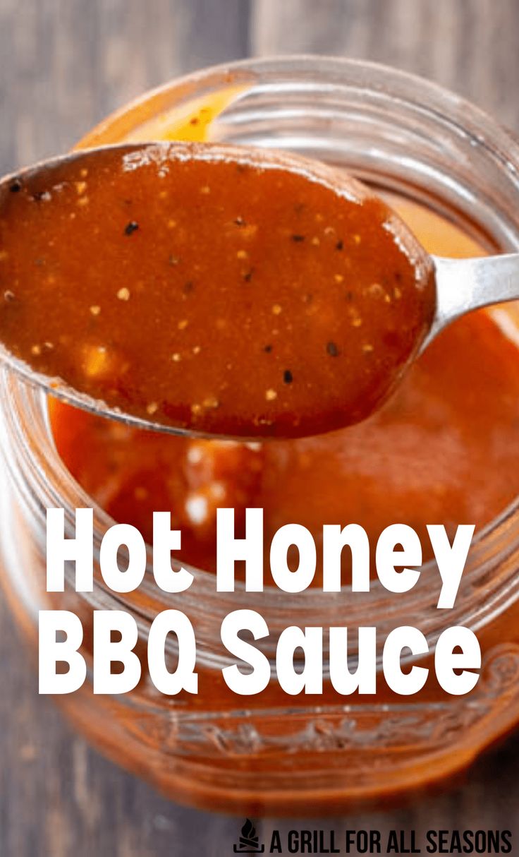 a spoon full of bbq sauce with the words hot honey bbq sauce on it