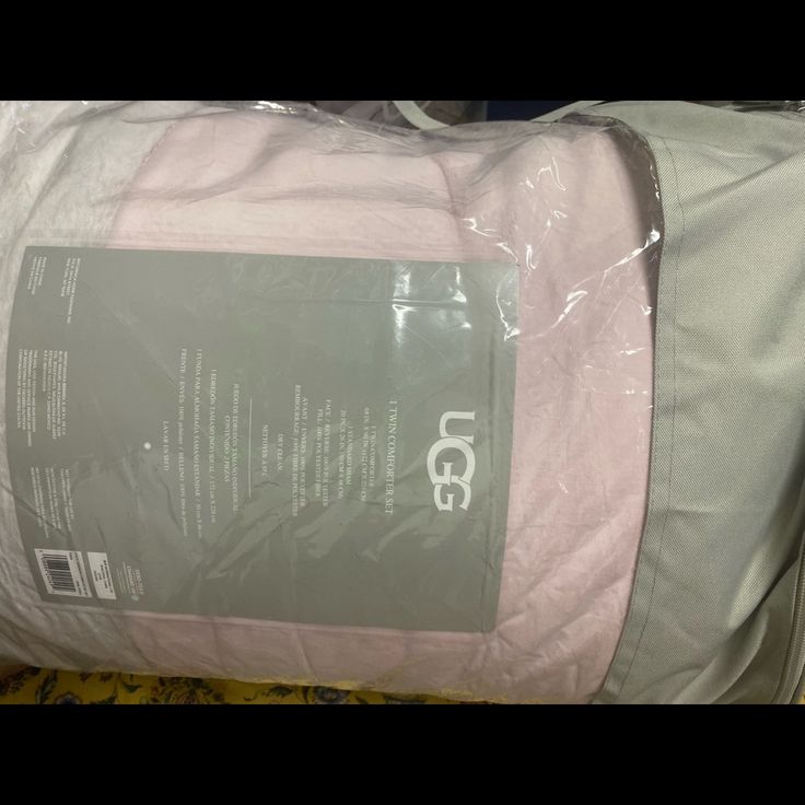 the inside of a bed with pink sheets