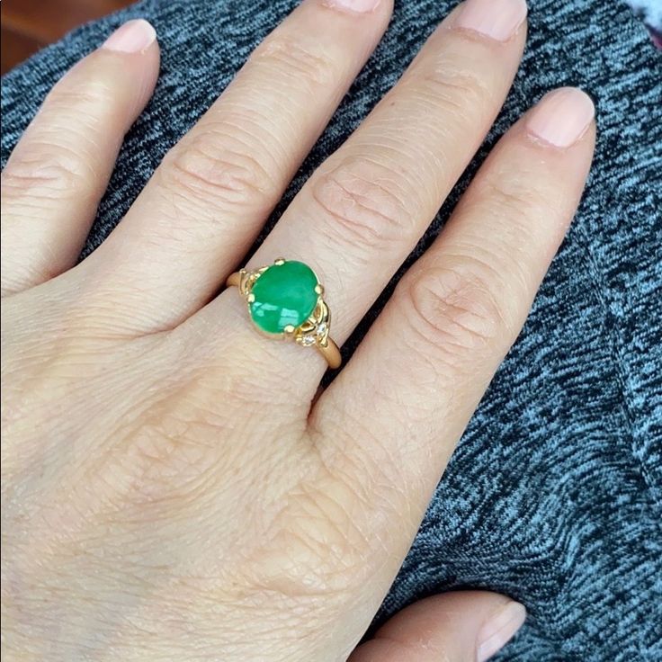 Description: 14k Yellow Gold Oval Jade Ring Item No.: R00311 Metal Type: 14k Solid Gold, Not Filled Or Plated Metal Color: Yellow Gold Type Of Stone: Jade And Cubic Zirconia Measurement: Size 6.75. Jade: 10 X 8 Mm. Top: 13 X 10 Mm Approximate Weight: 2.72 Gram(S) Brand New With Box Elegant Green Opal Ring In 14k Gold, Oval Gold Opal Ring In 14k Gold, Green Opal Oval Ring In 14k Gold, Classic Green Oval Opal Ring, Oval Opal Ring In Yellow Gold Stamped 14k, Oval Polished Emerald Ring In 14k Gold, Oval Emerald Ring With Polished Finish In 14k Gold, Oval Emerald Ring In 14k Gold With Polished Finish, Heirloom Yellow Gold Diamond Ring With Oval Cabochon