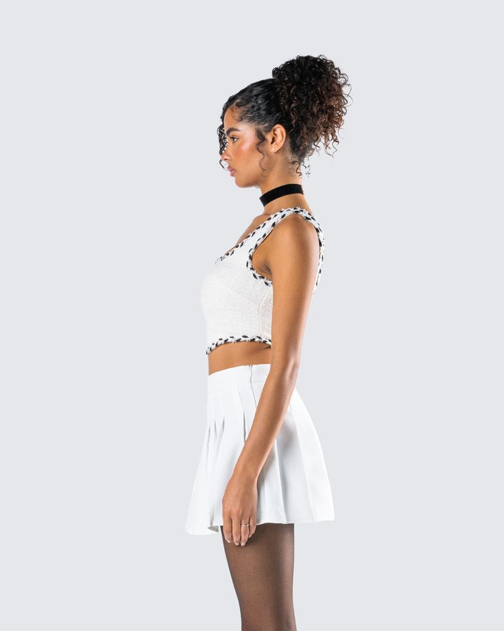 She may look classy, but don't get it twisted 🤍 This ivory bustier, made from tweed fabric and complete with contrast color trim detail, a square neck design, and a v-shaped hem, will add some class and sass to any look 😚 White Cropped Crop Top With Boned Bodice, White Sleeveless Crop Top With Boned Bodice, Fitted White Crop Top With Boned Bodice, White Boned Bodice Crop Top, Fitted White Crop Top With Lace Trim, Chic Fitted Lace Trim Crop Top, Chic Fitted Crop Top With Lace Trim, Square Neck Design, Look Classy