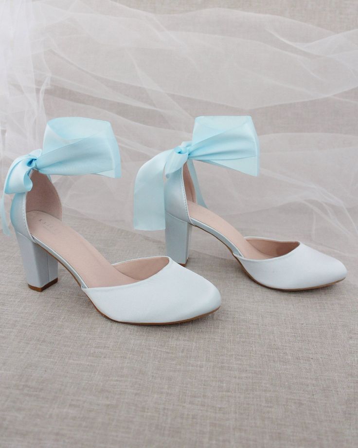 Satin block heel with satin ribbon ankle tie. Beautiful and yet looks fun and dramatic.DETAILS:HEEL HEIGHT: 3 inchesCOLORS AVAILABLE: Champagne, White, Ivory, Navy, Burgundy, and Light BlueUPPER: Synthetic upper and liningMATERIALS: Mandmade outsoleSTYLE NAME: SARAH Blue Ballroom, Heels Bride, Women Wedding Shoes, Bride Heels, Bridesmaids Shoes, Ballroom Shoes, Trendy Bride, Women's Slip Ons, Navy Blue Shoes