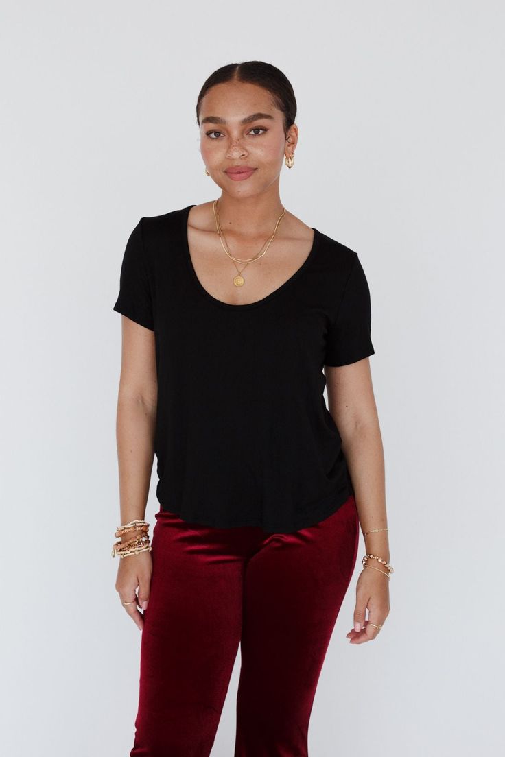 This Scoop Neck Bralette Tee is just the top you need to wear with trendy bralettes as this deep neckline is designed to flatter. The fabric is soft, the fit is straight, and the curved hemline is slightly longer in back to give you just what you need to rock your bralettes with easy style. Model is 5’6" and wearing a size small. Model is 5’8" and wearing a size small. Approximate measurements are as follows: Small: Bust: 36 3/4", Length(F): 24", Length(B): 28 1/4, Sleeve Length: 7 1/2" Medium: Cute Bralettes, Bell Bottom Jeans Outfit, Ruffled Denim Jacket, Lace Choker, Crochet Bralette, White Bralette, Bottom Jeans, Casual Night Out, Old T Shirts