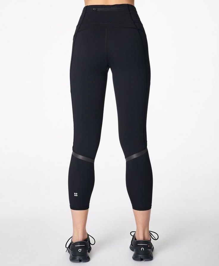 The bum-sculpting gym leggings designed for running. Ultra-lightweight Italian fabric is sweat-wicking and quick-drying. high-waisted design with adjustable waist and compression technology . Side pocket and back zip pocket. UV protection 40+ . Inseam length: 24" / 60cm. Model wears size S and is 178cm/5'10" tall. Style Code: SB4907PColour: Black Running Leggings, Yoga Shop, Gym Leggings, Running Tights, Leggings Design, Italian Fabric, Find Your Style, Ski Wear, Yoga Clothes