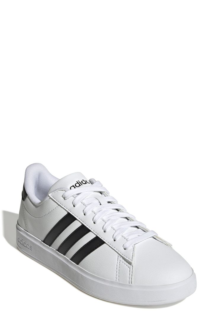 These Grand Court shoes combine a refresh of the much-loved 3-Stripes with Cloudfoam Comfort technology for a cushioned, comfortable fit Rounded toe Lace-up closure Cloudfoam cushioned insole Synthetic upper, textile lining, rubber outsole Imported Adidas Grand Court, Tennis Sneakers, White Core, Hot Shoes, Adidas Samba Sneakers, Court Shoes, Stylish Shoes, Tennis Shoes, Cute Shoes