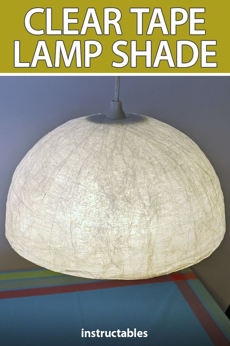 a white lamp shade with the words clear tape lamp shade on it and an image of a