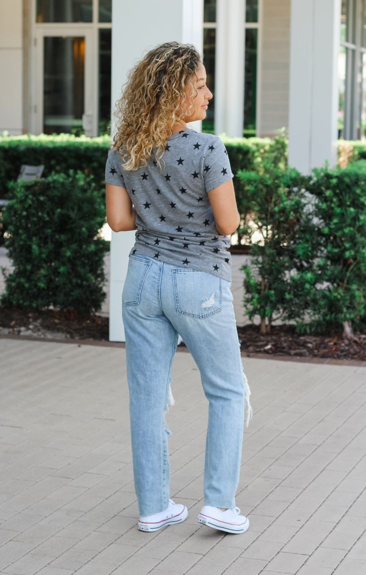 You'll be the "star" of the tailgate in our Clemson Superstar tee! So unique and so cute, you're sure to love this top! Pair it with your favorite denim for a cute and casual gameday outfit! Details: Crew Neckline Short Sleeve Relaxed Fit Color: Heather Grey with Black Stars Fabrication: 50% polyester, 38% Cotton, 12% Rayon Itzel is wearing size Small Casual T-shirt With Star Print For Spring, Relaxed Fit T-shirt With Star Print For Spring, Spring Relaxed Fit T-shirt With Star Print, Casual Fall Tops With Star Patch, Relaxed Fit Star Print Top For Fall, Casual Relaxed Fit Tops With Star Print, Casual Crew Neck T-shirt With Star Patch, Trendy Star Patch Tops For Spring, Trendy Tops With Star Patch For Spring