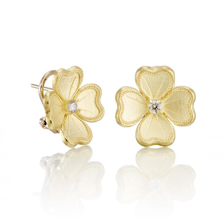 Heralding the arrival of spring, dogwood blossoms are faithfully re-created in 18-karat yellow gold and finished with a diamond pastil. Since 1861, Gump's has been a destination for jewelry that is distinctive and timeless. Featuring only the finest materials, each piece is a statement of elegance. Diamonds, 0.15ctw. 18-karat yellow gold. Pierced or clip. 5/8" long. Formal Yellow Gold Flower Earrings With Diamond Accents, Luxury Yellow Gold Flower Shaped Diamond Earrings, Luxury Yellow Gold Flower Earrings For Formal Events, Luxury Yellow Gold Flower Earrings For Formal Occasions, Elegant Gold Flower Earrings With Brilliant Cut, Fine Jewelry Yellow Gold Flower Earrings With Diamond Accents, Luxury Yellow Gold Flower Earrings, Anniversary Yellow Gold Flower Earrings With Diamond Accents, Yellow Gold Polished Diamond Earrings For Wedding