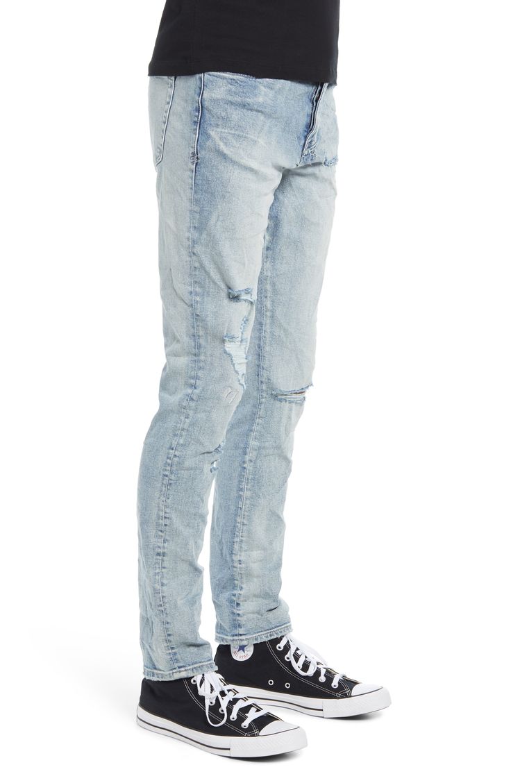 Torn-up style adds edgy appeal to skinny-cut jeans shaped from stretch-cotton denim for a flexible fit. Style Name:Ksubi Chitch Punk Trashed Skinny Fit Stretch Jeans (Philly Blue). Style Number: 6109696. Fitted Light Wash Distressed Jeans, Edgy Blue Jeans, Distressed Slim Fit Cotton Jeans, Slim Fit Distressed Cotton Jeans, Distressed Slim Fit Jeans, Urban Style Slim Fit Mid-rise Jeans, Fitted Washed Blue Jeans With Five Pockets, Ripped Fitted Cotton Jeans, Fitted Ripped Cotton Jeans