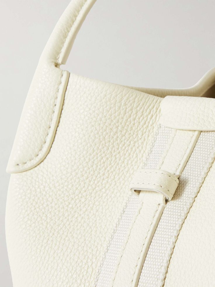 LORO PIANA Bale canvas-trimmed textured-leather tote White Calf Leather Shoulder Bag With Soft Leather, White Classic Calf Leather Bag, Classic White Calf Leather Bag, Luxury White Pebbled Leather Bag, Designer Bags With Grained Texture For Everyday Use, Luxury Grained Texture Shoulder Bag For Everyday, White Calf Leather Shoulder Bag For Daily Use, Luxury Everyday Bag With Grained Texture, Luxury Grained Texture Top Handle Shoulder Bag