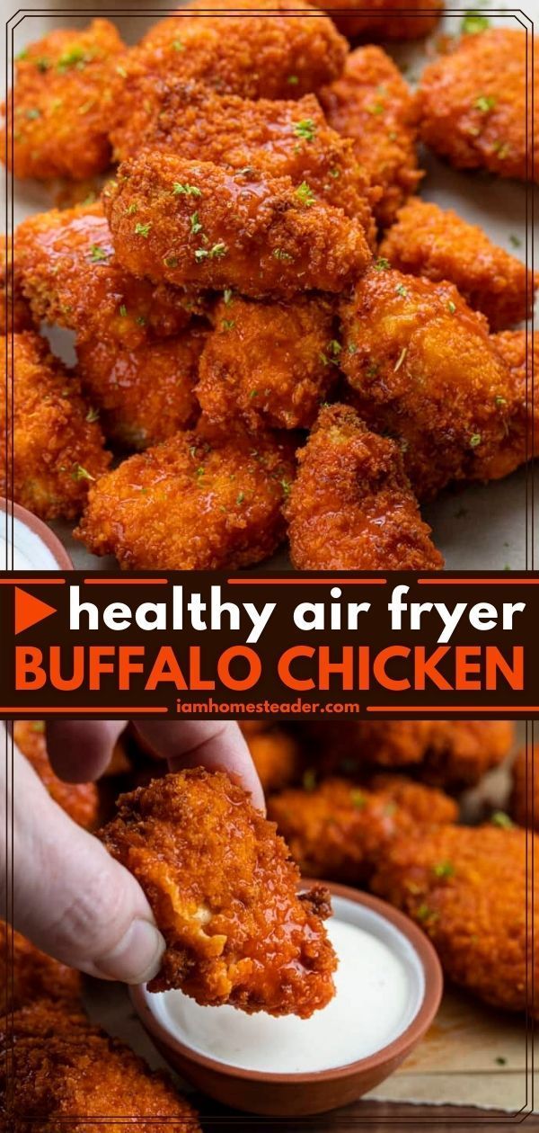 a person dipping sauce on top of some fried chicken wings with ranch dressing in the background