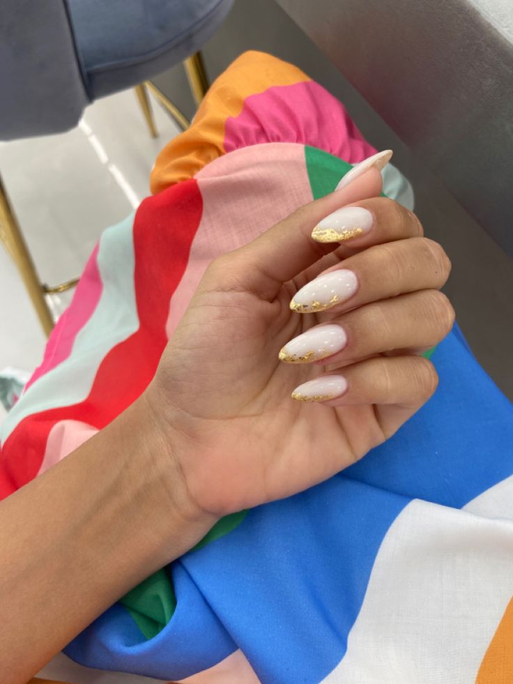 White Ombre Nails With Gold Flakes, Pearl Nails With Gold Flakes, Gold Flake Nails Pink, Milk White Nails With Gold, Milky Nails Gold Foil, Summer Nails With Gold Flakes, Milky White Nails With Gold Flakes, French Tip Nails With Gold Flakes, White Nails Gold Flakes