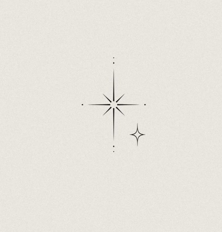 a black and white drawing of a star with two smaller stars in the middle of it