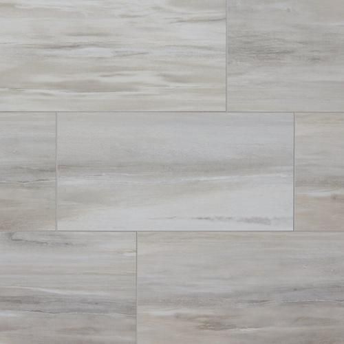 a white tile floor with grey and beige tones