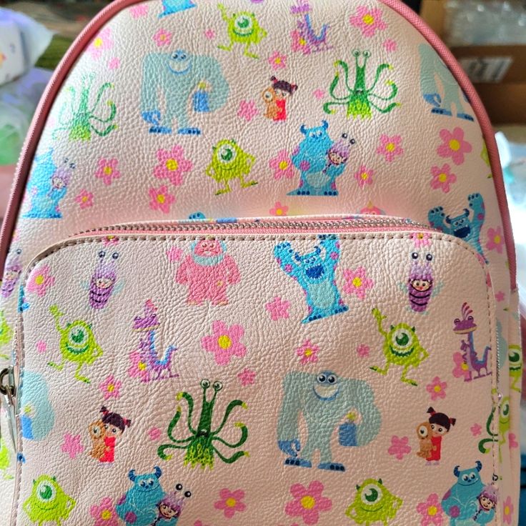 Super Awesome Danielle Nicole Disney Monsters Inc. Great Backpack Design. Exclusive And Hard To Find. This Is A Fun Summertime Bag. It Has A Large Zipper Compartment And A Smaller Zipper Compartment On The Front With Adjustable Leather Straps. Great For Everyday Use. Disney Style Backpack For School, Pink Backpack For Disney Trips With Zipper Closure, Pink Backpack With Zipper Closure For Travel, Fun Pink Bags With Cute Design, Pink Bags With Cute Design And Fun Style, Pink Fun Bags With Cute Design, Pink Bags With Cute Design, Pink Disney Bag For Daily Use, Multicolor Backpack For Disney Fan Events