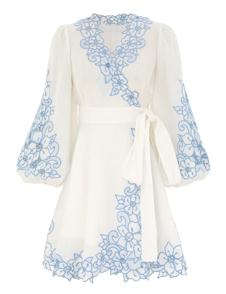 The Golden Embroidered Mini Dress in Ivory/Blue from our Summer Swim 2024 Collection. A linen embroidered mini dress featuring a wrap around waist belt, a deep V-neckline and blouson sleeves. Designer Resort Wear, Zimmerman Dress, Resort Wear Dresses, Embroidered Mini Dress, One Piece Clothing, Resort Dresses, Linen Mini Dress, Summer Swim, Mini Dresses For Women