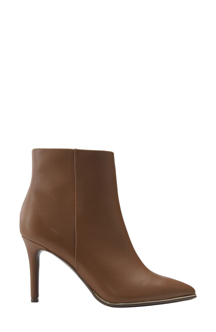 A slim, sky-high heel elevates a sleek and striking bootie crafted from faux leather in a pointy-toe silhouette trimmed in gleaming hardware. 3 1/4" heel Synthetic upper/textile lining/synthetic sole Imported Workwear Ankle Boots With 4-inch Heel, Pointed Toe Heeled Boots With 4-inch Heel For Work, Ankle Heeled Boots For Workwear With 4-inch Heel, Fall Workwear Heeled Boots With Contrasting Heel Counter, Chic Pointed Toe Heeled Boots With Heel Tab, Fitted Ankle-high Heeled Boots With Zipper, Office Heeled Boots With Padded Ankle, Fitted Heeled Boots With Padded Ankle For Office, Pointed Toe Heeled Boots With Heel Tab For Work