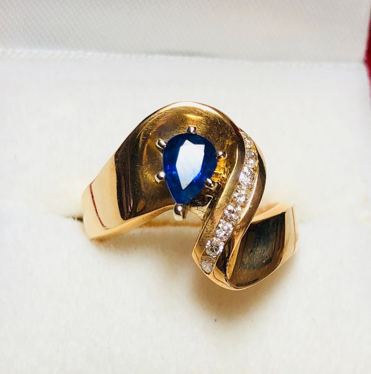 Beautiful Vintage 14k Yellow Gold Natural Sapphire Diamond Ring 100% Genuine Diamonds And Natural Sapphire Beautiful and clean genuine Sapphire Sapphire(s) 0.60CT Diamond(s) 0.20CT Color: H Clarity: SI2 Total ring weight: 6.8GR 14K Yellow Gold Ring sizing available Free of Charge For more information regarding this item feel free to reach me so I can accommodate your needs. Thank you Teardrop Gemstone Ring For Formal Occasions, Formal Pear-shaped Sapphire Ring With Vvs Clarity, Formal Vvs Clarity Pear-shaped Sapphire Ring, 14k Gold Teardrop Diamond Ring For Anniversary, Pear-shaped Diamond Ring Fine Jewelry, Teardrop Sapphire Ring With Diamond, Classic Teardrop Gemstone Rings, Formal Pear-shaped Sapphire Ring, Fine Jewelry Pear-shaped Diamond Ring For Formal Events