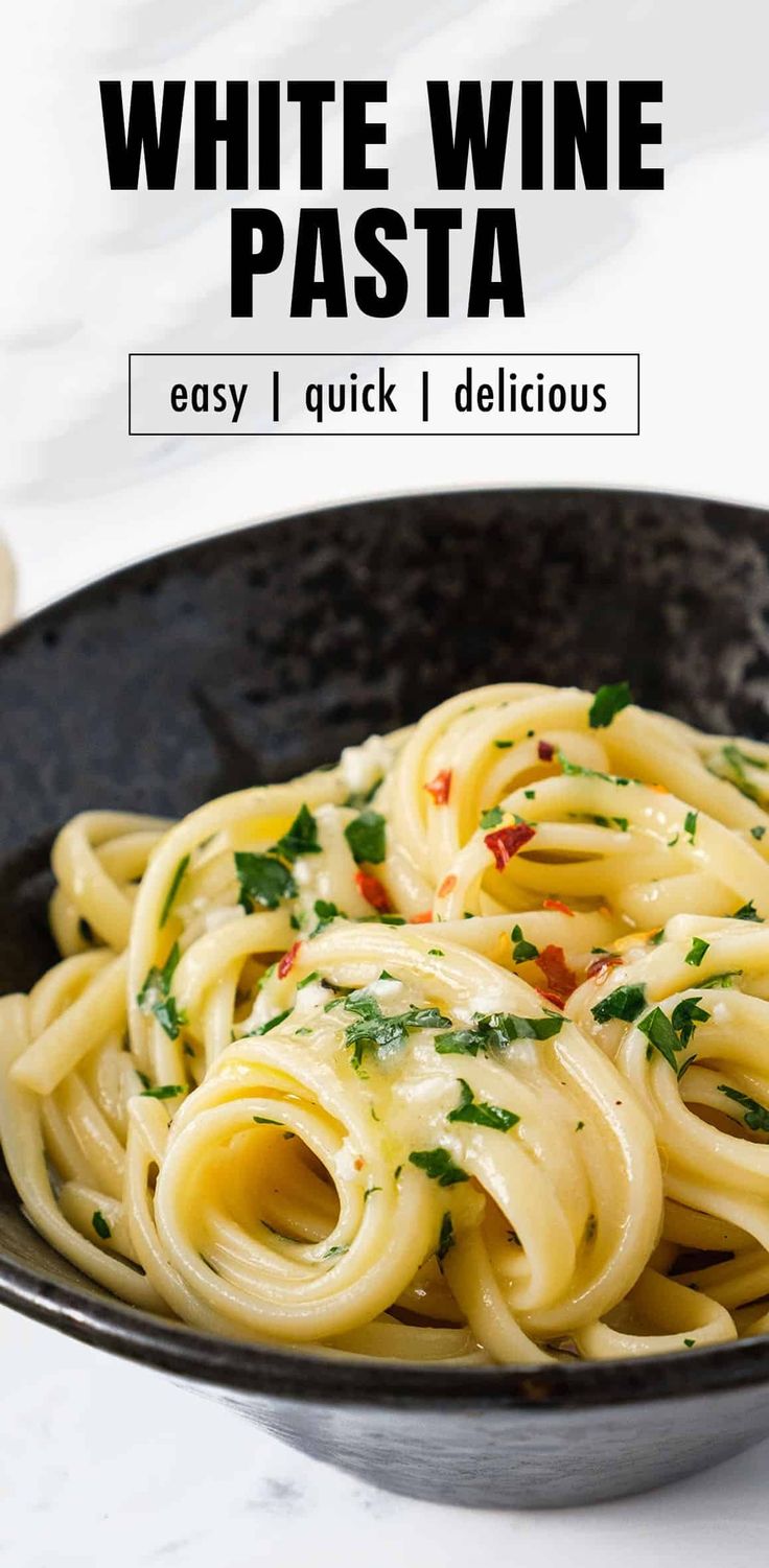 a black bowl filled with pasta and topped with parsley on the side text reads white wine pasta easy, quick, delicious