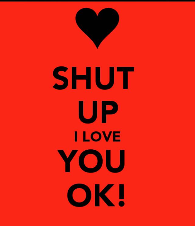 the words shut up i love you ok on a red background with a black heart